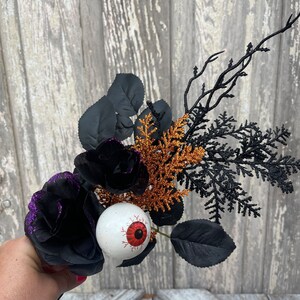 Halloween Eyeball in Rose floral Stem with twigs and orange cedar