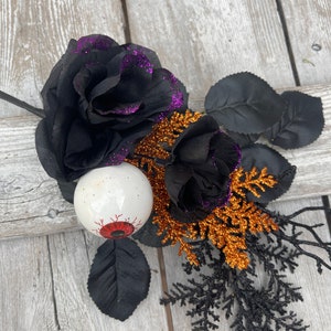 Halloween Eyeball in Rose floral Stem with twigs and orange cedar