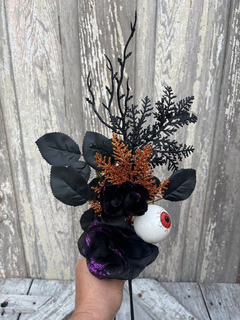 Halloween Eyeball in Rose floral Stem with twigs and orange cedar