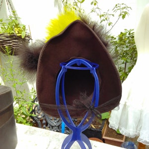 Genuine vintage 1940s hat. Used for &quot;going away&quot; immediately after the wedding. Brown with green and brown feathers. very unusual and rare.