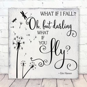 May include: Black and white sign with a quote about fear of falling and the beauty of flying. The quote reads "What if I fall? Oh, but darling, what if you fly?" - Erin Hanson. The sign features a dandelion with seeds blowing in the wind.