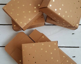 24 Adventskalender Schachteln Boxen Kraftpapier braun goldene Sterne