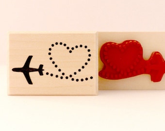 Stamp airplane hearts