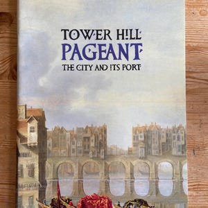 May include: A set of three ceramic mugs with a speckled, matte finish. The mugs are in cream, light grey, and dark grey. Each mug has a simple, minimalist design, ideal for coffee or tea.