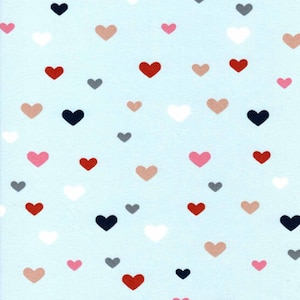 May include: A light blue background with a repeating pattern of hearts in various colors, including red, pink, white, black, and gray.