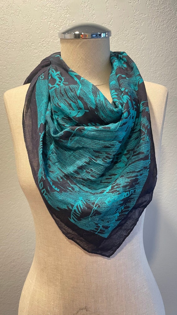 Turquoise jungle motif scarf