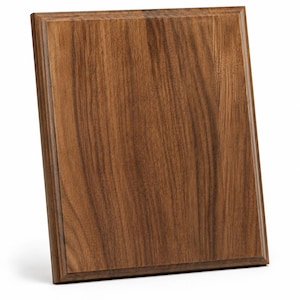 May include: A rectangular wooden plaque featuring a rich brown grain pattern. The plaque has a smooth, flat center surface surrounded by a beveled edge frame, showcasing the natural texture and variations of the wood material throughout the piece.