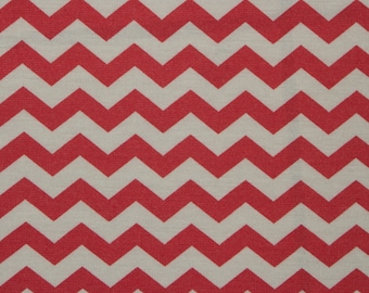 May include: Red and white chevron pattern fabric. The fabric has a subtle texture.