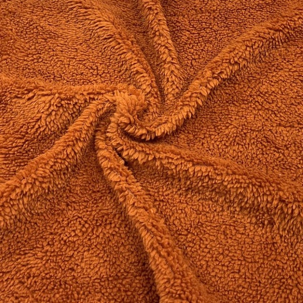 Fausse fourrure sherpa orange n° 32 100 % polyester poils moyens Tissu extensible super doux très doux 58 à 60 pouces de large par mètre