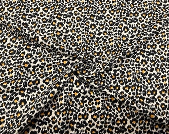 Tejido elástico para prendas de vestir de poliéster y elastano doblemente cepillado con estampado de leopardo color crema mostaza DBP n.° 552, 190 g/m², ancho de 58" a 60", cortado a medida.