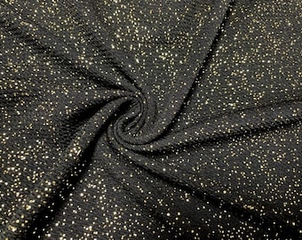 May include: Black fabric with a subtle texture and a fine gold glitter throughout.
