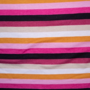 May include: Striped fabric with alternating bands of orange, pink, black, and beige.
