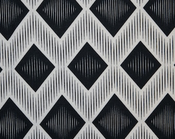 May include: Black and white geometric fabric with a repeating diamond pattern. The diamonds are filled with thin vertical lines.