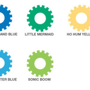 May include: Eight colorful gear-shaped icons with text labels below each. The icons are red, blue, green, yellow, black, orange, light blue, and lime green. The text labels are "Code Red", "Star Command Blue", "Little Mermaid", "Ho Hum Yellow", "Mouse Ears", "Orange Blast", "Buzz Blaster Blue", and "Sonic Boom".