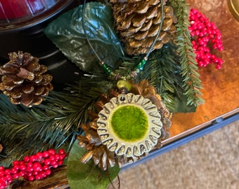 Green and Glowing Starburst Pendant on Leather with Green Murao Glass and Sterling Silver Beads