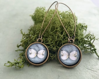 Pendientes colgantes de doble cara de mariposa amarilla simple