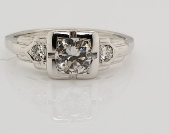 Platinum Art Deco antique 0.36ct round diamond three stone ring