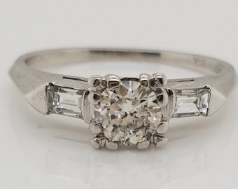 Platinum three stone Antique Diamond Ring with Baguettes