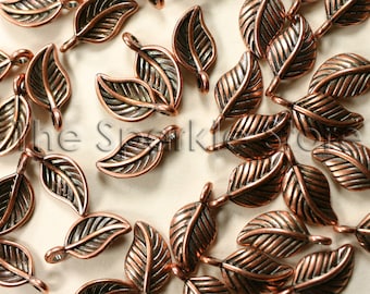 leaf charm with loop, 7 x 10mm, antique copper finish, cast leaf charm bead, see photos for both sides, 1mm loop (#06-2009E)