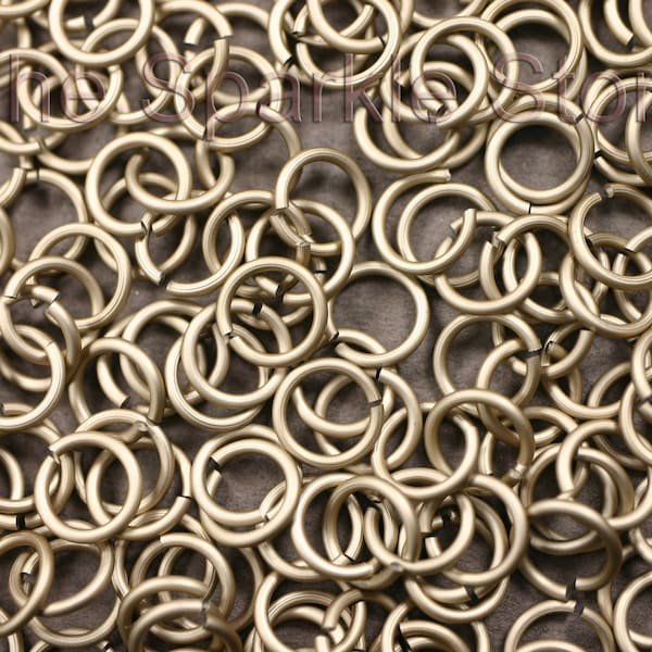 100 18ga matte beige jump rings, 7mm OD, 5mm (3/16") ID, anodized aluminum matte champagne rings, 18 gauge wire, (05-2005C), qty. 100