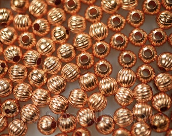 4mm solid copper fluted beads, small copper beads, USA made, fits onto 18 gauge or finer wire, (#06-1009A) 100 beads