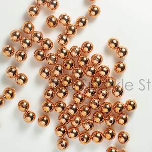 4mm Copper Beads, 1.4mm hole, made in the USA, 100 beads per package, pure copper (19-1006)