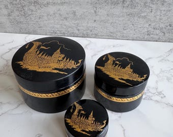 Thai lacquer box set of three black and gold trinket boxes