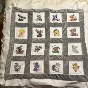 Embroidered quilt: cotton, flannel and fleece , choose the theme and will include embroidered designs based on theme