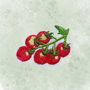 May include: Embroidered patch featuring a cluster of red tomatoes with green stems and leaves. The tomatoes have a white border, and the patch is set against a light green, watercolor-style background. Ideal for adding to clothing or accessories.