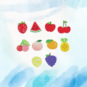 May include: A collection of embroidered fruit patches, including a red strawberry, watermelon slice, apple, cherries, peach, orange, pineapple, lemon, and grapes. Each patch features detailed stitching and vibrant colors, perfect for adding a touch of whimsy to clothing or accessories.