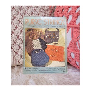 May include: A book titled "PURSE STRINGS" showcasing macrame handbag designs. The cover displays various handmade macrame purses in brown, blue, and orange. The book includes knotting diagrams, detailed instructions, and full-colour photographs.