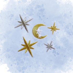 May include: Embroidered celestial patches featuring a gold crescent moon with two white stars, and four starbursts in gold and silver. The patches are on a light blue watercolor background.