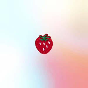 May include: A red strawberry patch with green leaves and white seeds. The embroidered patch is a cute, colorful accessory for clothing, bags, or other fabric items. The patch is approximately 1.5 inches wide and 1.75 inches tall.