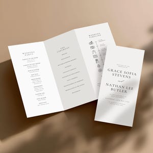 May include: A wedding program and invitation suite. The program is a folded brochure with sections for the wedding party, ceremony details, and timeline. The invitation features the names Grace Sofia Stevens and Nathan Lee Butler.
