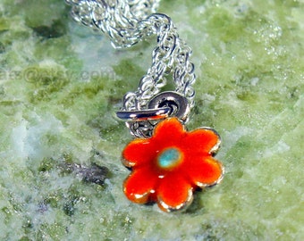 Orange Glow in the Dark Daisy Pendant. Handmade Glowing Floral Jewelry Gift for Gardeners or Nature Lovers!