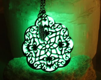 Green Glow in the Dark Filigree Pendant with Emerald Feather Charm Drop. Antique Brass Glowing Necklace. Dance Rave UV Glow Party Jewelry!