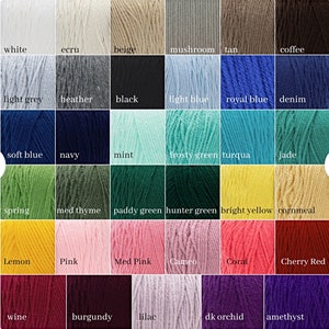 May include: A color chart of yarn skeins in a variety of colors, including white, black, blue, green, yellow, pink, and purple. Each color is labeled with its name, such as "white," "black," and "royal blue."