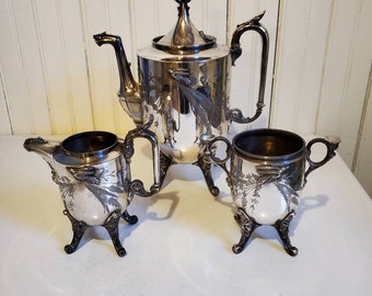 Victorian 1871 Reed Barton Tea Set Silverplate Birds Northwind Face