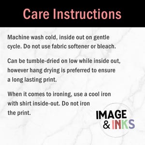 May include: A white graphic card with the heading Care Instructions in pink text. The text provides instructions to machine wash cold inside out on gentle cycle, avoid bleach or softener, tumble dry low, hang dry, and use a cool iron on the reverse.