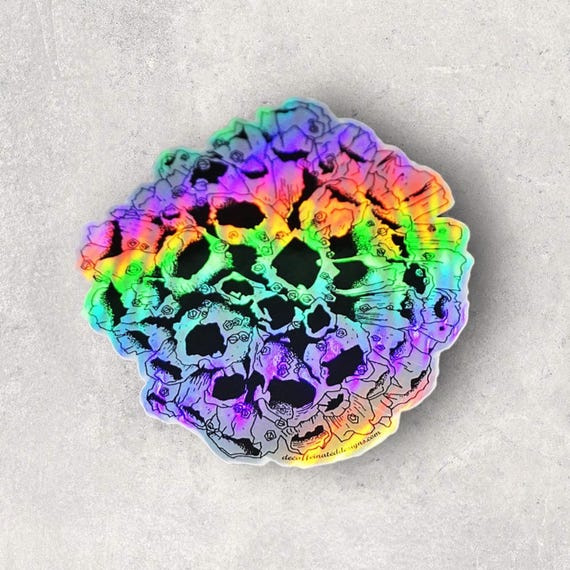 “Barnacle Ball” Holographic Sticker (4x4)
Our first-ever Inktober drawing is now a stunning holographic sticker! Inspired by the resilient barnacles that thrive in the sea, this 4x4 design captures the strange beauty of these tiny arthropods as they spread and cover everything in their path. Durable and eye-catching, this sticker is perfect for adding a bit of oceanic charm and shine to your collection.