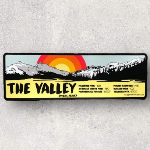 There are so many beautiful places here in Juneau Alaska locals have to clarify where they are talking about. “The Valley” is located in the heart of the Mendenhall valley where we have several iconic mountains towering above the Mendenhall Glacier. Some climbable others... not so much. This vinyl sticker will hold up to just about anything you throw at it, scratch resistant waterproof and dishwasher safe. A perfect addition to your bumper.