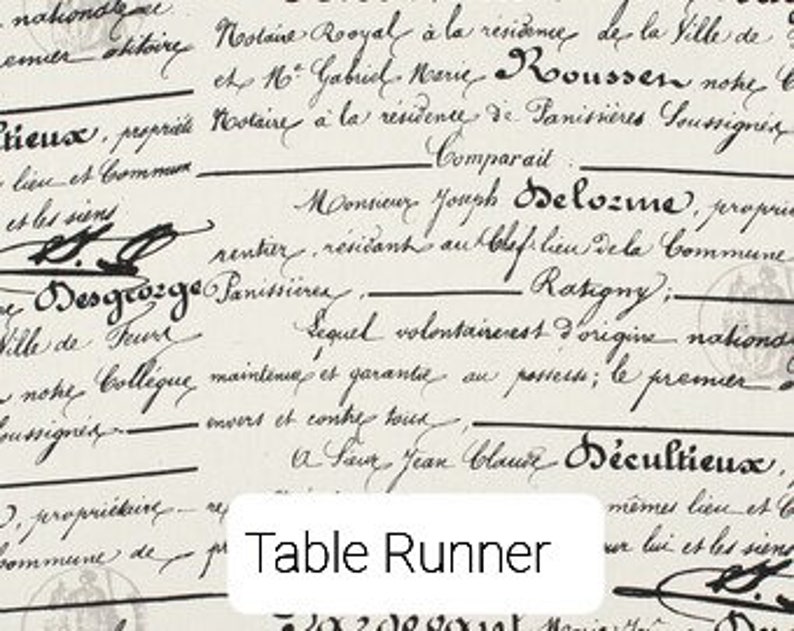 May include: A white table runner with a vintage French script design. The text includes the words "Table Runner" and "2020deguat".