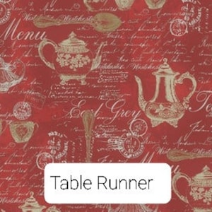 May include: Red table runner with a repeating pattern of teapots, teacups, and spoons in a gold color. The words "Menu", "Time", and "Tea" are visible in a script font. The text "Table Runner" is in a white rectangle.