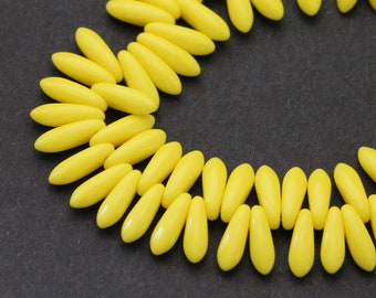 Set of 25 or 50. Pale Yellow Green transparent w Light Gold luster 16 x 4mm daggers