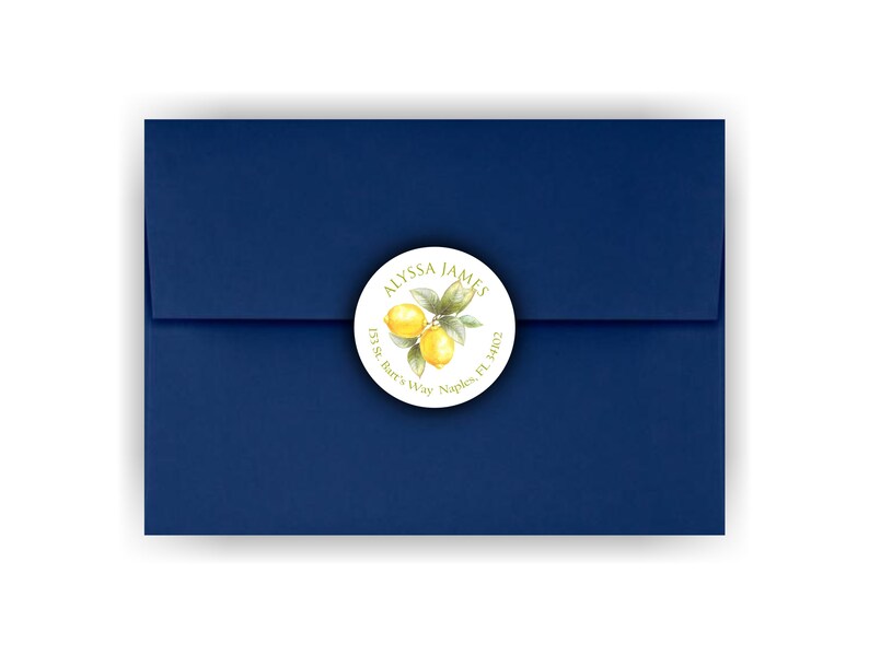 May include: A white round sticker with a lemon illustration and the text "ALYSSA JAMES 131 St. Bar's Way Naples, FL 34102"