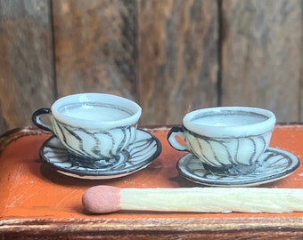 Set of two 1:12 scale zebra striped dollhouse miniature wheel thrown teacups with saucers made in porcelain
