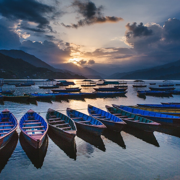 Boats on a Lake with Mountains at Sunset in Pokhara, Nepal || Fine Art Photography