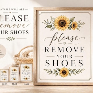 Puede incluir: Un cuadro enmarcado con la frase "PLEASE remove YOUR SHOES" en una fuente decorativa, adornado con ilustraciones de girasoles. Disponible en varios tamaños, incluyendo 12,7x17,8 cm, 20,3x25,4 cm, 28x35,6 cm y 40,6x50,8 cm.
