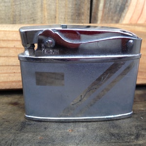 Vintage Silver colored Penguin lighter