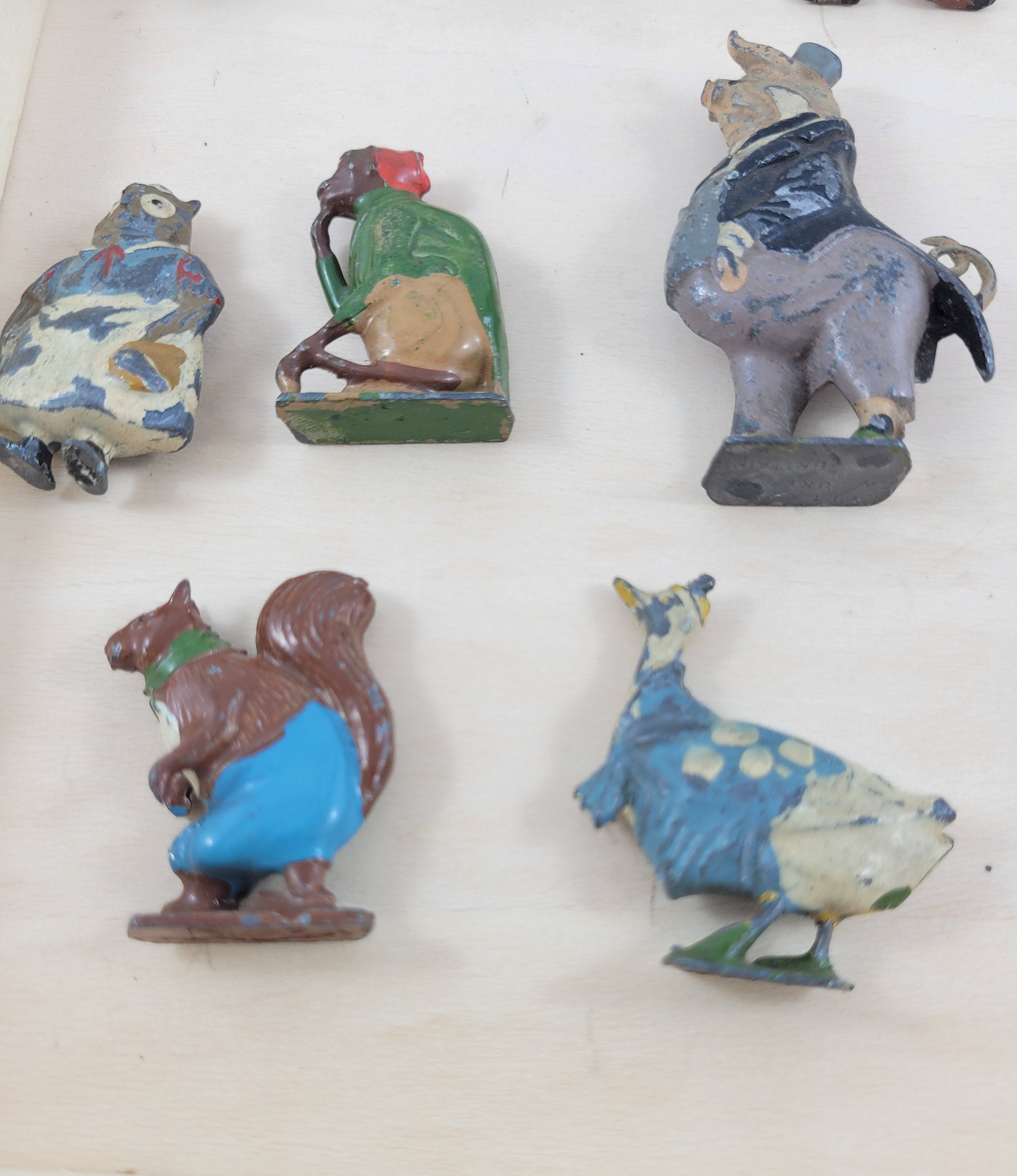 A collection of vintage Cadburys Cococubs hollowcast hand-painted lead